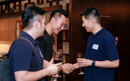 Alumni networking at a global event in Beijing.